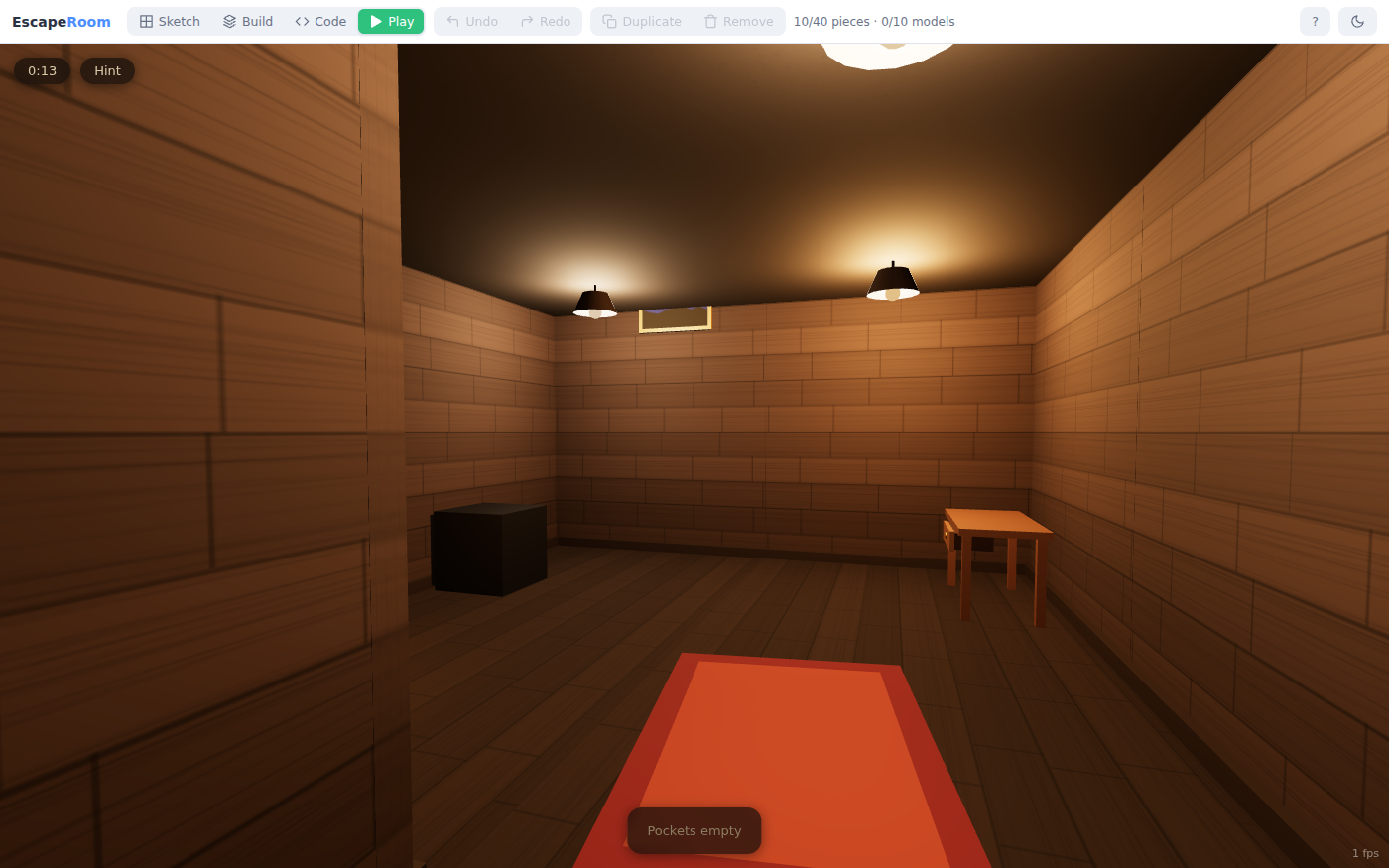 Play mode inside The Locksmith's Attic: a warm wood-paneled room seen at eye level, two lamps hanging from a dark ceiling, a painting high on the far wall, a dark safe on the floor to the left, a writing desk to the right and a red rug underfoot. A clock in the corner reads 0:13 beside a Hint button, and Pockets empty sits at the bottom.