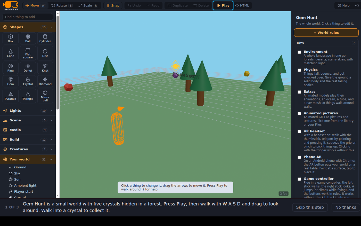 The BlocksVR editor with Gem Hunt open: a green meadow with cone-and-cylinder pine trees, a red crystal and a gold crystal among them, a sun, and the orange outline of the player's start point. The left panel lists shapes to add and the world's contents; the right panel lists kits like Environment, Physics and VR headset.